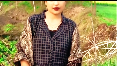 Hot brunette girl in pink lingerie plays with a black toy