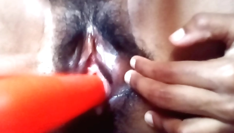 Indian girl masturbating on the bed after using dildo