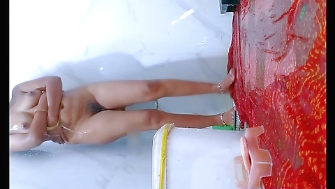 Indian hottie plays with her hairy pussy in shower