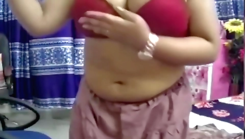 Indian brunette is naked in front of the web camera