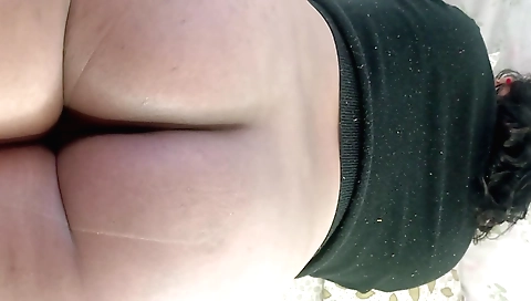 Big ass amateur brunette is in front of the camera