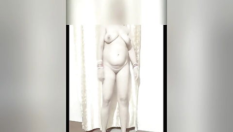 Indian woman in short dress with a sexy body and big tits