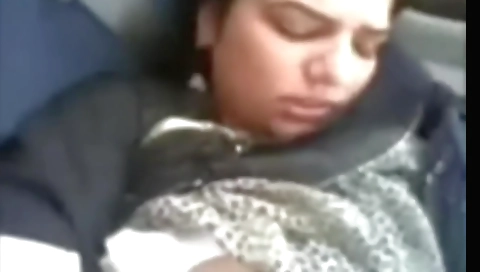 Amateur brunette with big boobs fucks herself in the car