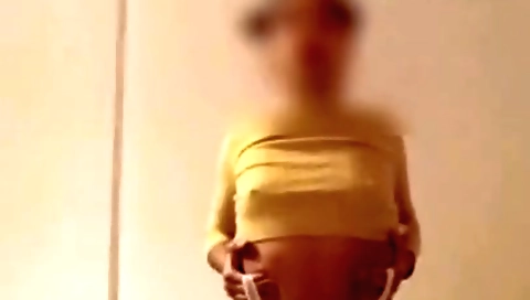 Sexy brunette in pantyhose takes off pantyhose for webcam