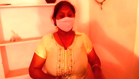 Indian brunette walks around the balcony and touches furniture