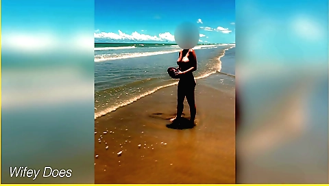 A sexy amateur milf plays with a football outdoors