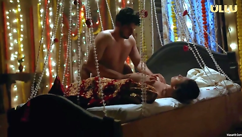 A brunette in sexy dresses is with a guy and they make love