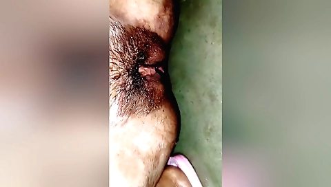 Hairy naked solo vid showing her natural tits and ass