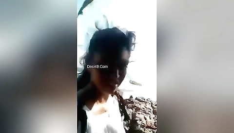 Hot brunette babe with big tits 18+ in outdoor movie