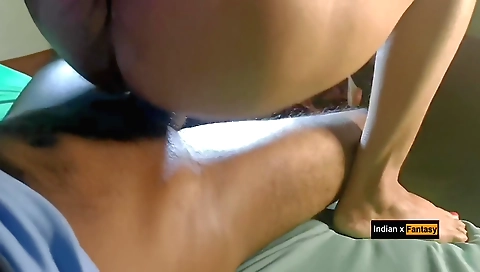 Indian girl rides boyfriend's cock with mouth and hands