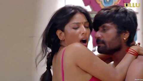 Brunette girl in a cute outfit enjoys a fist on the net