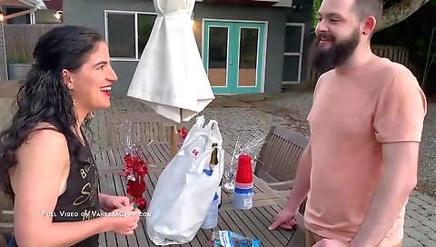 Busty brunette and a couple of fans getting hot with a girl