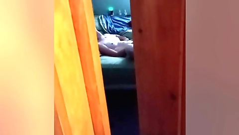 My wife was watching porn while working and I filmed her