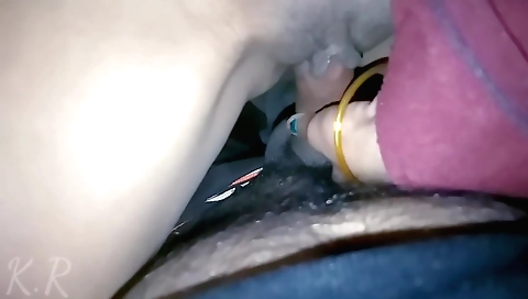 School girls sharing one's favorite classroom chair