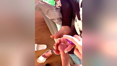 Cute woman receives handjob by a big black cock in the room