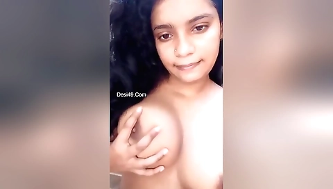 Amateur indian brunette shows her big boobs on camera