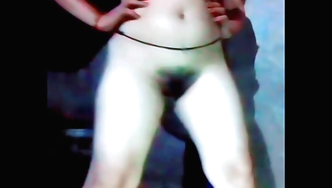 Indian brunette naked on a bed after her hair is rubbed