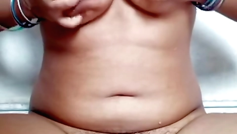 Indian solo girl plays with a dildo in her hairy pussy