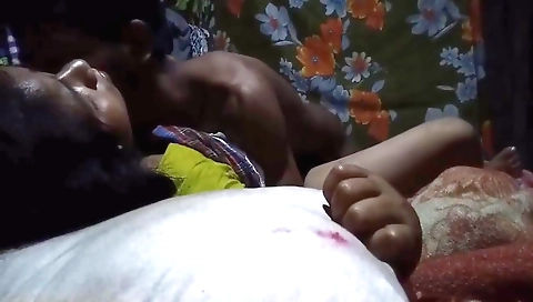 Brunette in a black blouse and a white skirt in webcam video