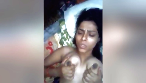 Indian slut masturbating on webcam with her big tits