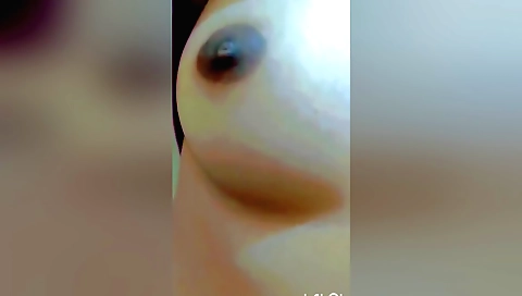 Sexy blonde 18+ beauty in red dress and blouse shows off