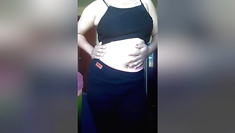 Indian chick in black lingerie strips and shows off