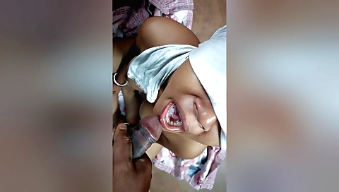 Indian bhabi with big tits is sucking on a dick and drinking cum