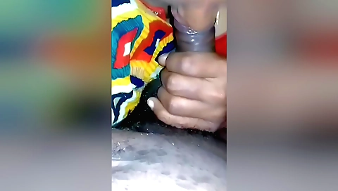 A desi in a white blouse gives a handjob in a video