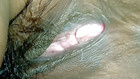 Indian hairy porn video with a girl in bed showing her body