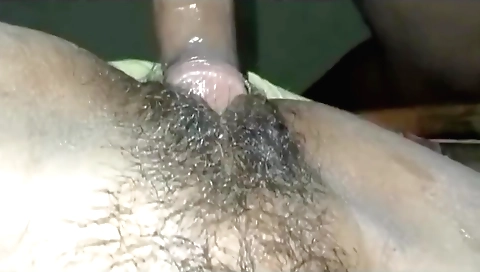 Indian babe is in the shower and she is showing her hairy pussy