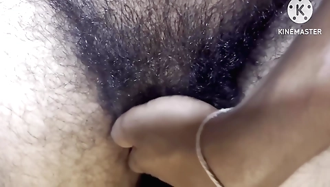 Indian girl with hairy pussy masturbates in amateur video