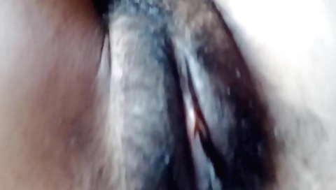 Hindu hottie shows off hairy pussy in solo sex video