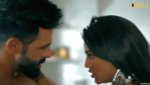 A sexy brunette milf in a sexy dress is in the rickshaw